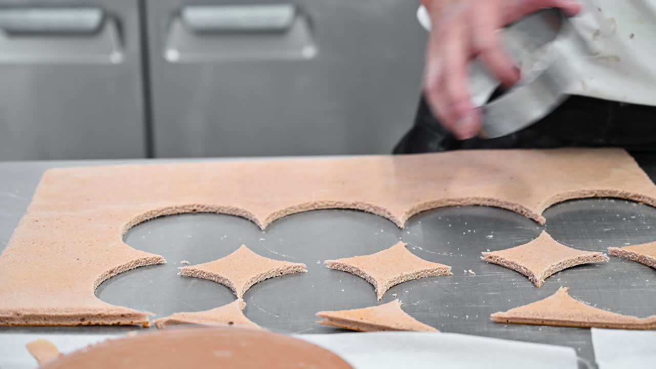 Pastry chef cutting sponge cake layers with round shape mold. High quality 4k footage