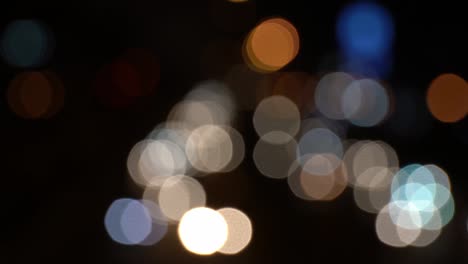 blurred circle bokeh traffic on the road at night