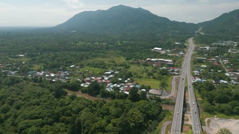 aerial drone view, serian district town ,summer with beautiful green trees,new building and water park lake, water from the mountain sarawak,borneo.