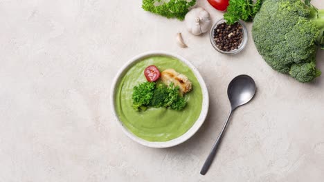 ingredients for broccoli cream soup with parsley and crouton.