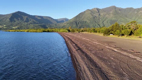 bird's eye view over the shores of villarrica lake in araucania, chile