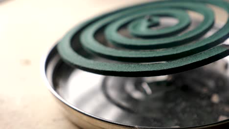 mosquito coil repellent
close up of mosquito coil