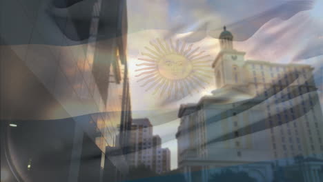 Argentinian flag with sun animation overlaying cityscape with tall buildings