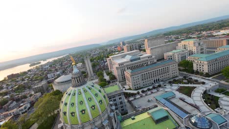 Golden-hour-sunset-over-Pennsylvania-Capitol-building-and-dome-in-Harrisburg,-PA