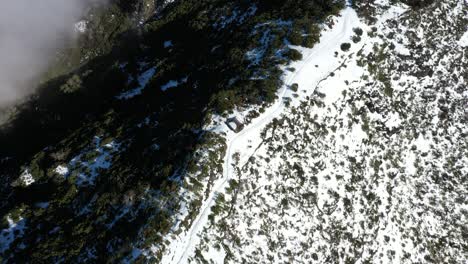 Aerial-shot-of-the-thin-path-on-the-mountain-Pico-Ruivo-in-Madeira