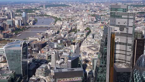 close up aerial view of the london towers from the walkie talkie building to the gherkin