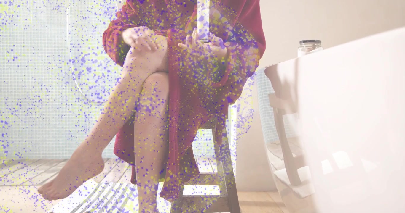 Woman entering bathroom and starting beauty routine by dispensing lotion onto legs before bath
