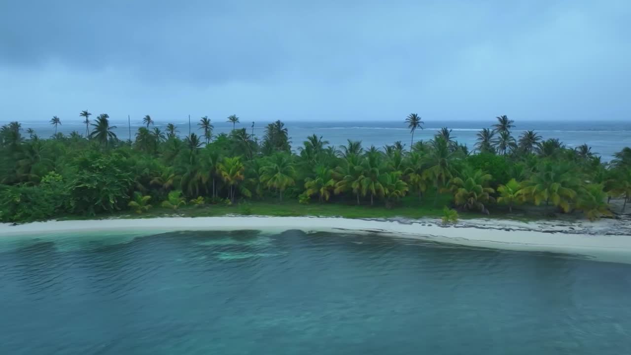 San Blas Island, Panama with clouds in sky. Medium Drone dolly Right to left HD