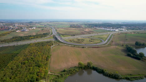 intersection and junction of an expressway in the vicinity of green areas and water reservoirs - gdansk, borkowo, straszyn