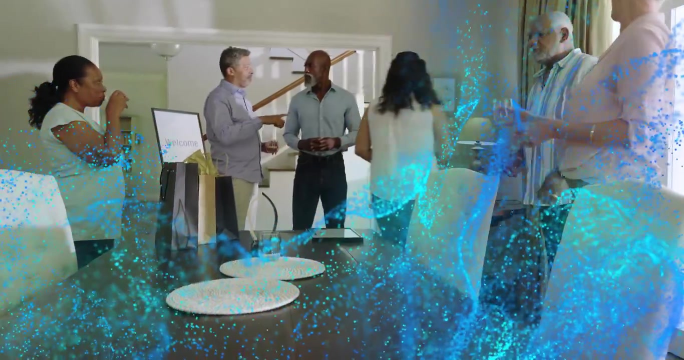 Six people meeting at table for event, guest entering as turquoise veil receding, plates being set