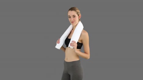 Slim-model-posing-with-towel-on-her-shoulders