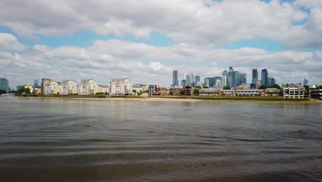 London-Finacial-District-filmed-from-the-shore-of-Greenwich-on-a-bright-sunny-day