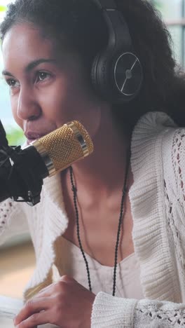 engaging conversation with a podcaster in a cozy studio setting