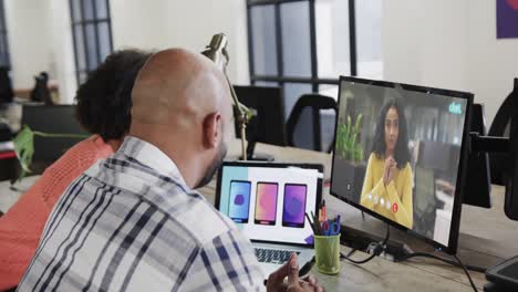 African-american-business-people-on-video-call-with-african-american-female-colleague-on-screen