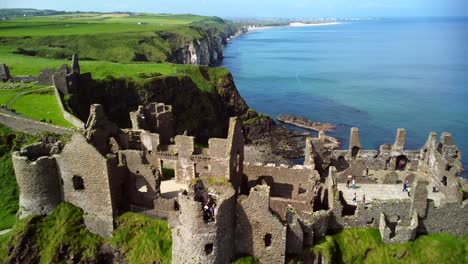 Aerial-shot-of-Dunluce-Castle,-in-Bushmills-on-the-North-County-Antrim-coast-in-Northern-Ireland