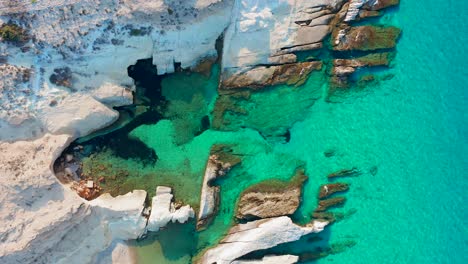 static topdown bay beach milos coastline greece