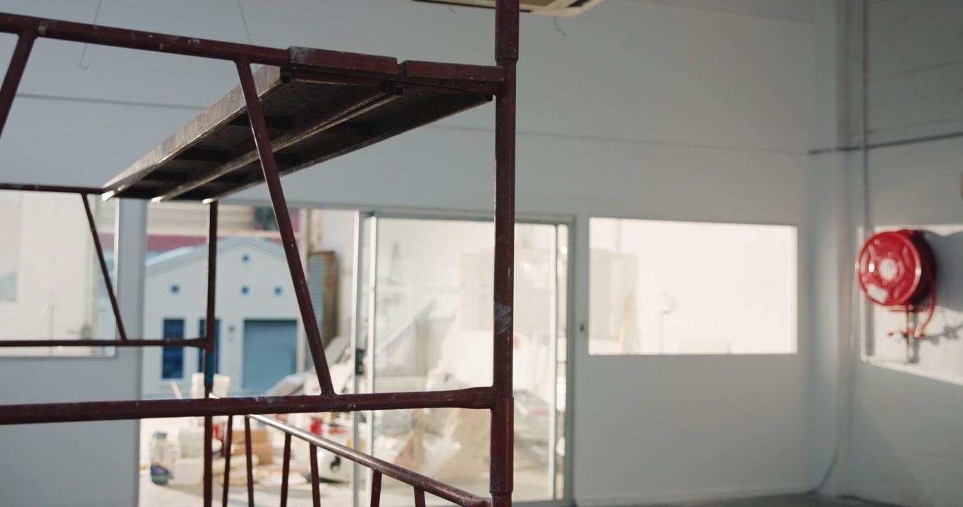 Scaffolding Structure Inside an Empty Industrial Warehouse