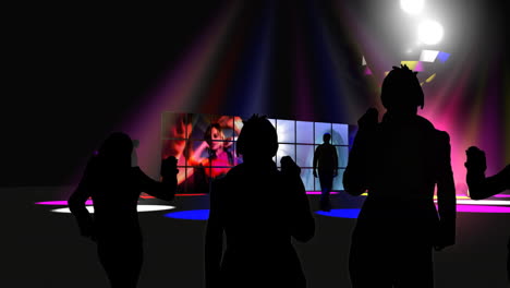 Silhouette of people dancing with colorful spotlights