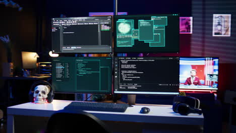 programming scripts shown on pc displays in empty hideout used by cybercriminals