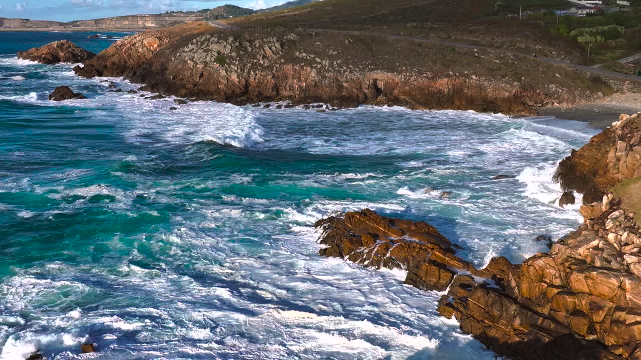 Rocky Coastline with Waves Crashing on Rocks