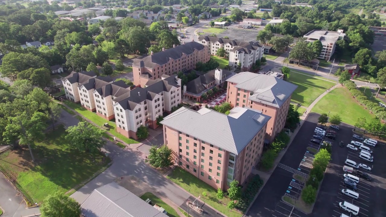 Aerial video of the University of Arkansas at Little Rock flying over residence halls