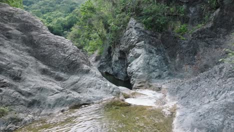 cascades through rocky canyons in las yayitas, bani, province of peravia, dominican republic