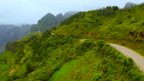 aerial pan left of the magnificent nho que river with its turquoise blue green water in the gorgeous ma pi leng pass in northern vietnam