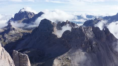 aerial over the tre cime di lavaredo mountain peaks on sunny morning