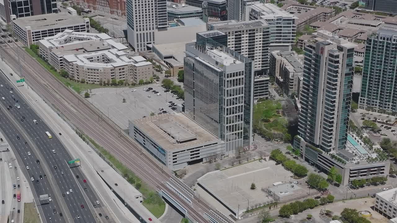 View of downtown Dallas, Texas from above showing city buildings and roads