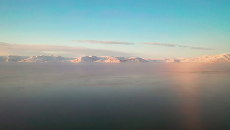 stunning landscape on a foggy morning in hornafirdi, south iceland. sunrise in hornafirdi. - aerial drone