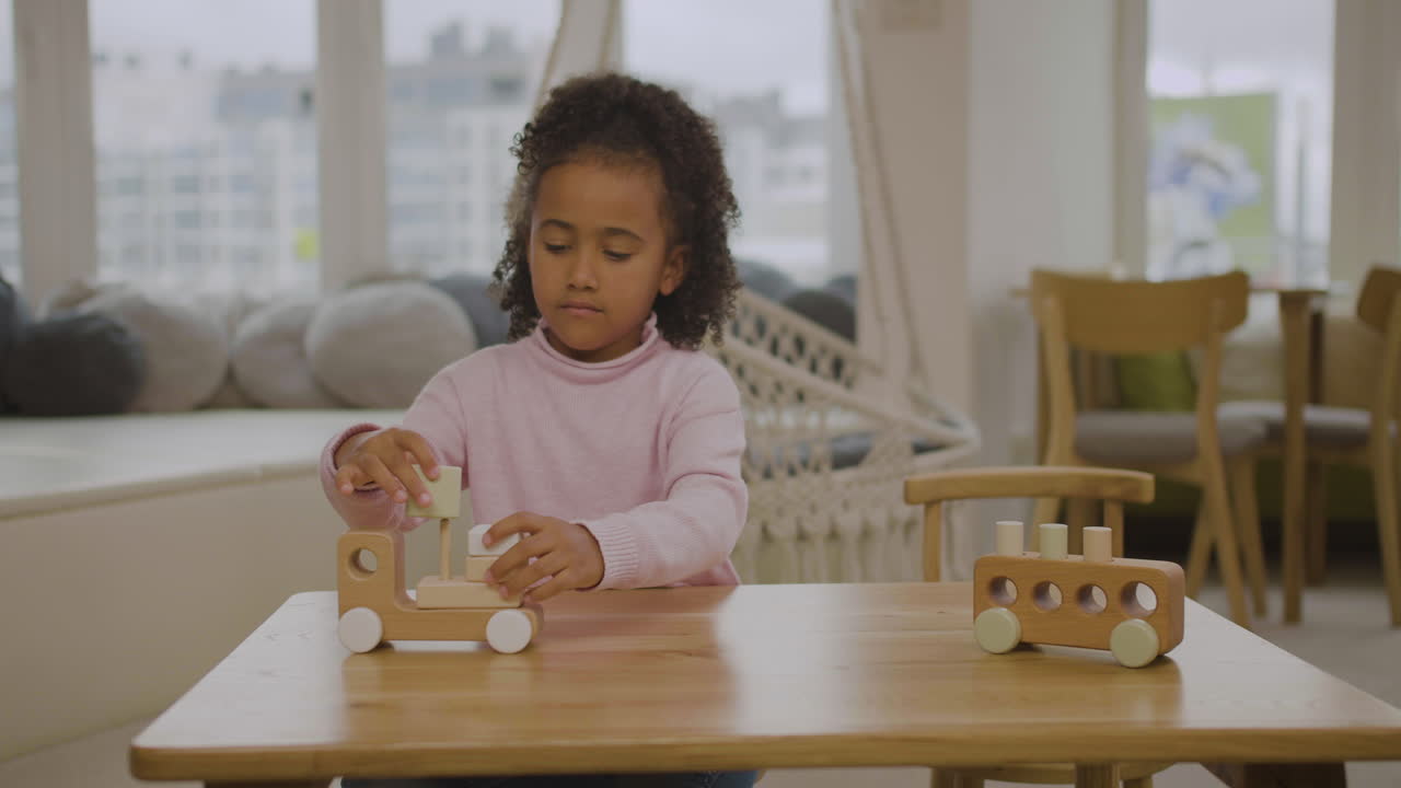 Little girl in the playroom
