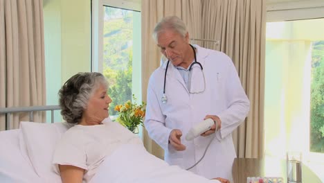 doctor examining blood pressure of a patient