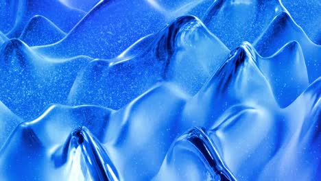 looped abstract liquid background with wavy sparkling pattern on shiny glossy surface. viscous blue fluid like surface of foil or brilliant glass. beautiful creative festive backdrop. simple bright bg