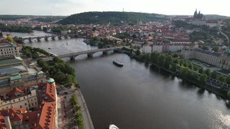 City-Prague,-bridge-and-streets,-aerial-view,-Vltava-river