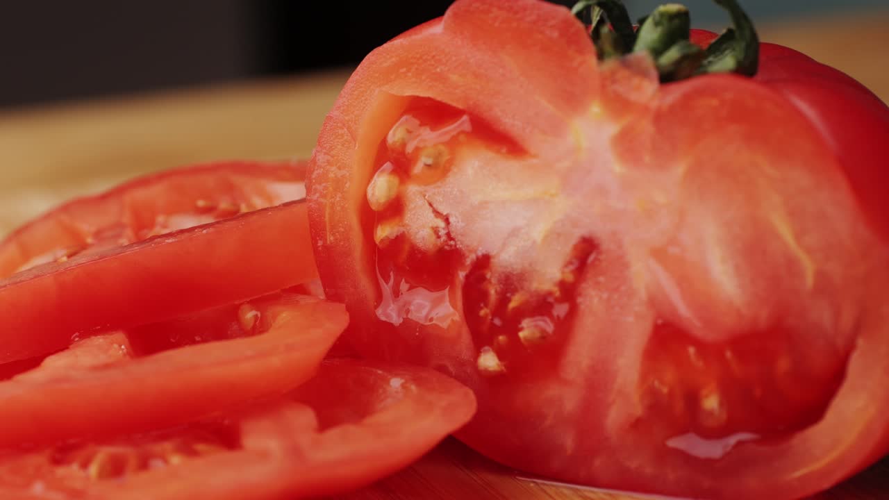 Chop tomato close up, Diced tomatoes on a cutting board for Italian sauce, chef cut tomatoes with knife.