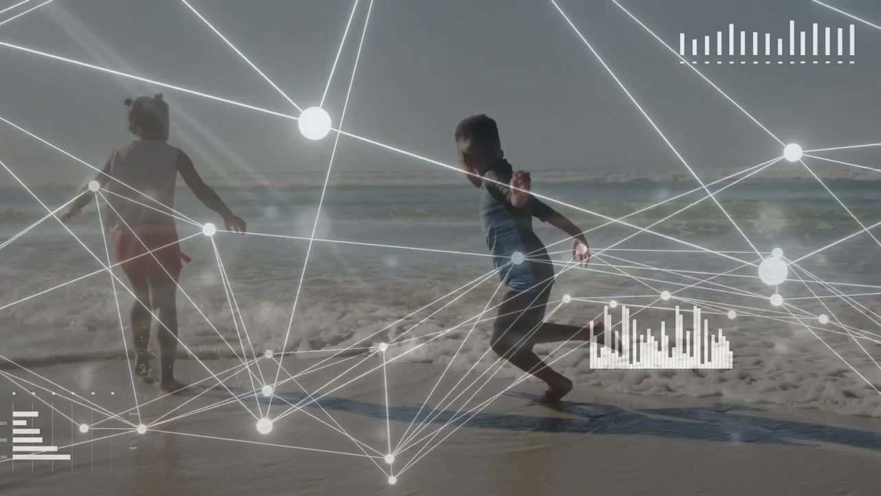 Boy shifting weight, kids playing toward surf and splashing while HUD overlaying passively for tech