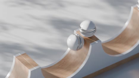 abstract geometric composition with rolling balls on wooden ramp