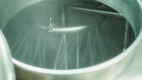 craft beer production factory, brewery manufacture, cooking alcohol in metal vats bottles