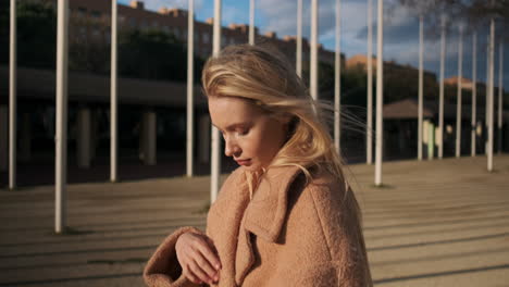 young woman walking outdoors.