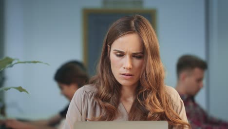 concentrated woman thinking about project. business woman reading documents