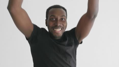 young hipster handsome afroamerican black man dancing hip hop style.