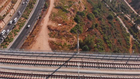 aerial views of highways and rail in mountainous terrain