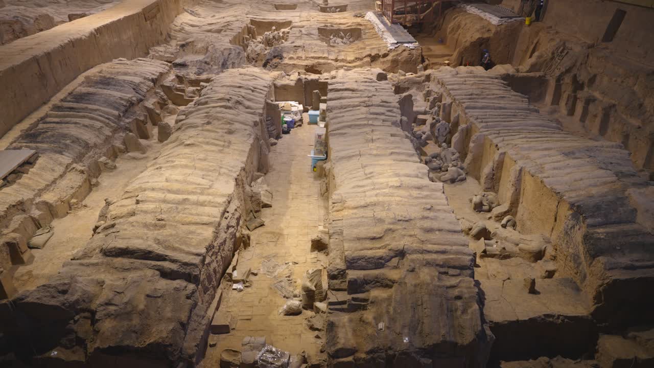 Wide view of excavation trenches at Terracotta Army archaeological site in Xi'an