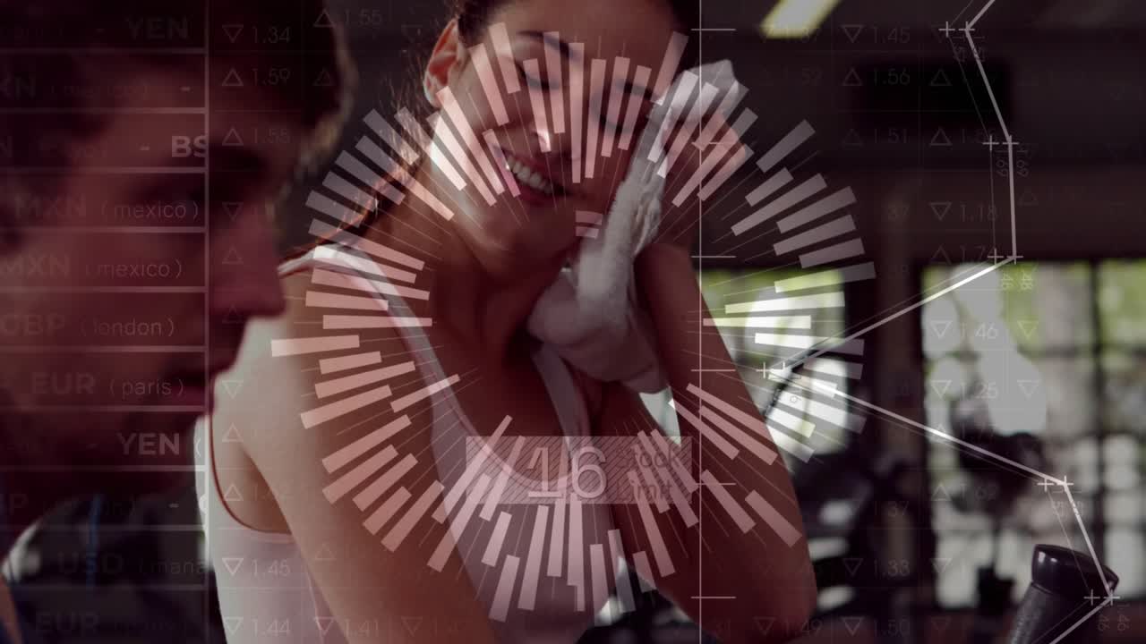 Female athlete finishing workout wiping face with towel at gym, HUD center updating metrics