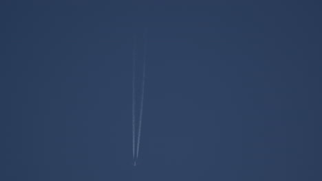 high-altitude airplane with contrail