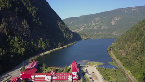 red roof hotel resort at mountain lake in three valley gap, canada