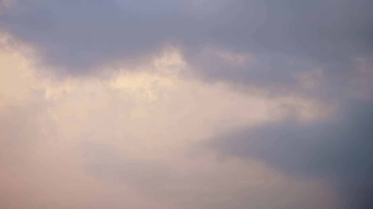 Dramatic Sunset Sky Clouds Background, Colourful Big Stormy Beautiful Storm Clouds in the Sky with Copy Space for Text