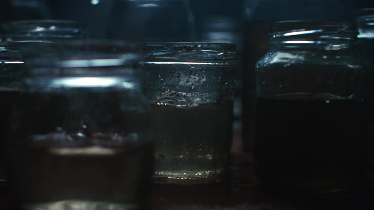 Water driping on glass jars