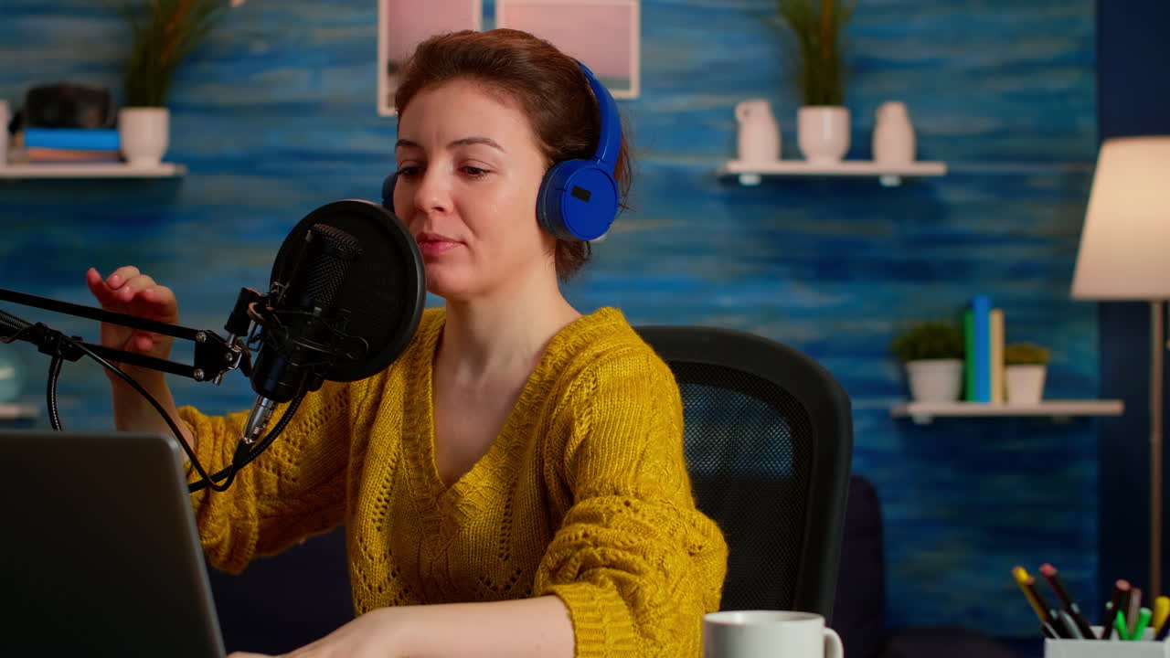 Vlogger recording tutorial about lifestyle in home podcast studio