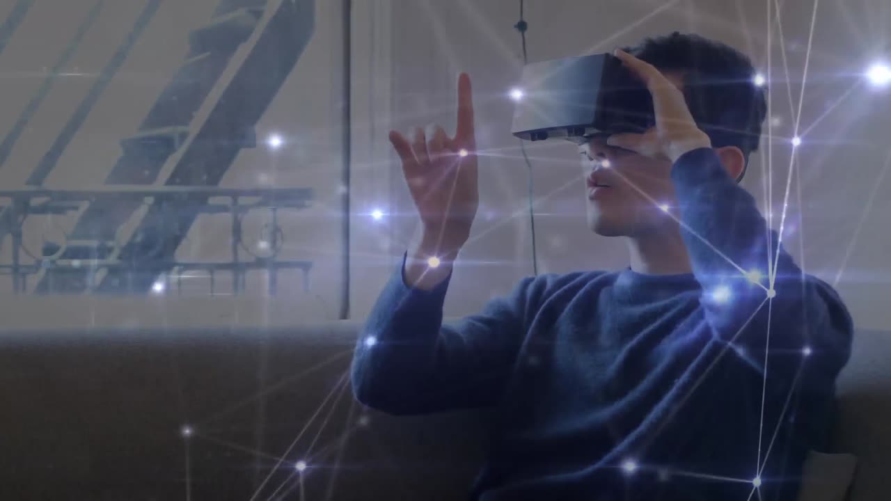 Animazione di una rete di connessioni sopra un uomo d'affari che indossa visori VR